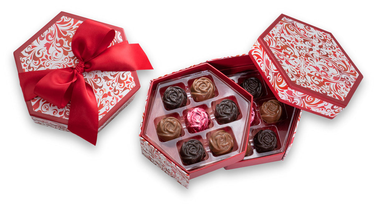 A keepsake gift box filled with rose-shaped chocolate-covered sea salt caramels