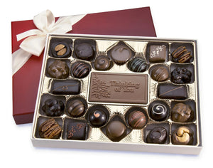 Gourmet chocolate gift assortment with a message bar