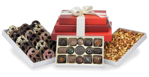 Gift tower with chocolates, roasted nuts and gourmet pretzels