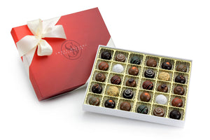 30 chocolate truffles in a gift box with a bow