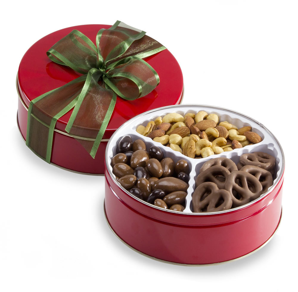 Red tin filled with nuts, bridge mix and chocolate-covered mini pretzels