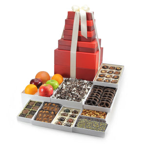 Gift tower with fruit, nuts,  chocolates, popcorn and pretzels