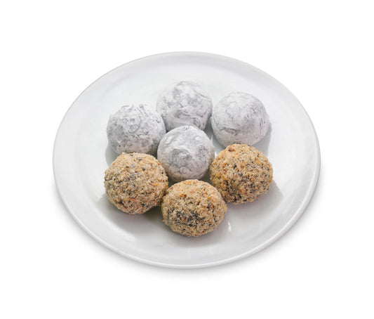 Champagne truffles in powdered sugar and Hazelnut truffles rolled in nuts