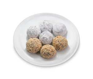 Champagne truffles in powdered sugar and Hazelnut truffles rolled in nuts