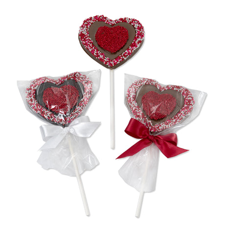 Heart-shaped solid chocolate lollipops with Valentine nonpareils