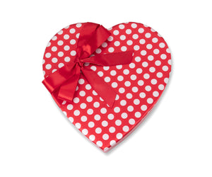 Red Valentine chocolate box with white polka dots and a red ribbon