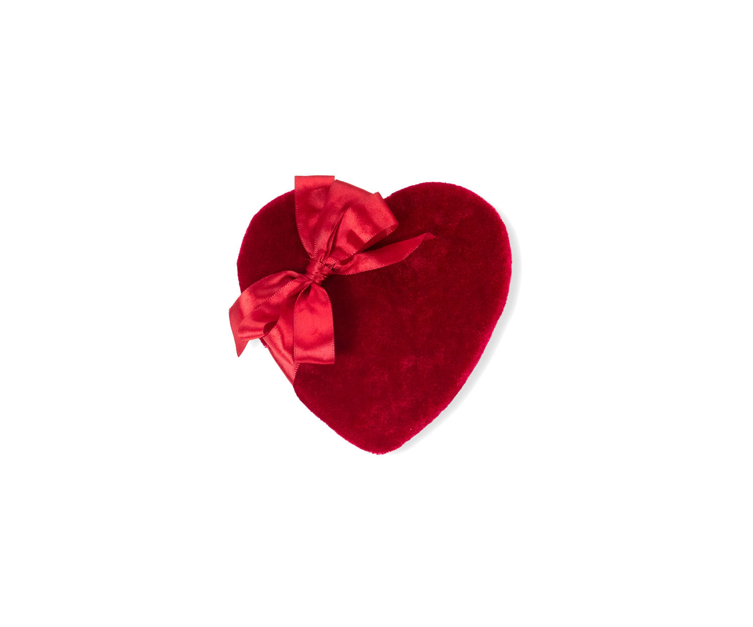 Traditional velvet Valentine's Day heart-shaped box with red bow