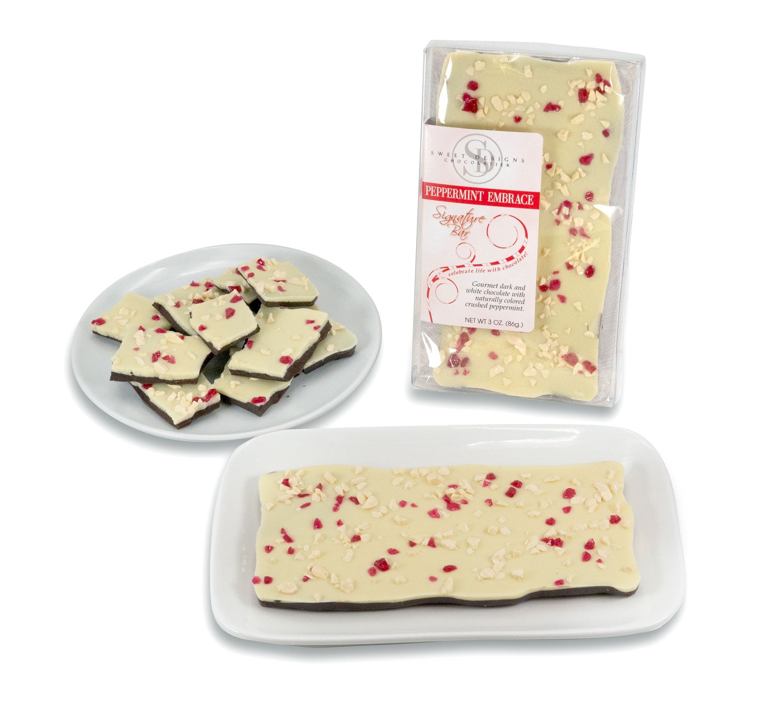A white and dark chocolate bar sprinkled with crunchy peppermint pieces