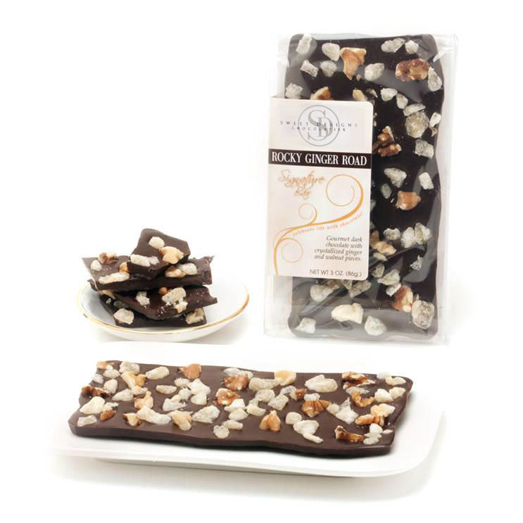 Dark chocolate bar topped with crystallized ginger and almond pieces