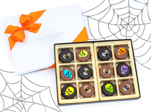 Chocolate-covered Oreos with Halloween-themed sugar candies on top