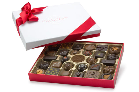 30 piece box of assorted chocolates in a gift box with bow