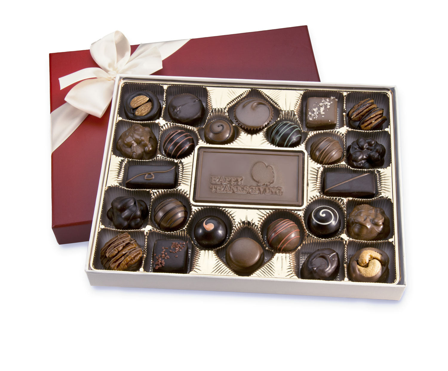 A gift box of assorted chocolates with a Happy Thanksgiving bar in the center