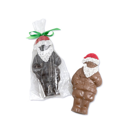 Solid chocolate Santa with holiday decorations