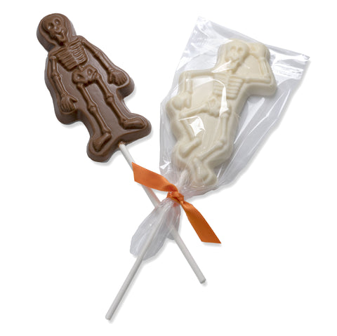 Milk and  white chocolate skeletons on a stick