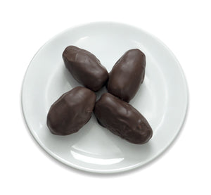 Pistachio-filled dates covered with vegan 70% dark chocolate 