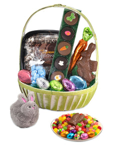 Green and white traditional Easter Basket with treats and a toy